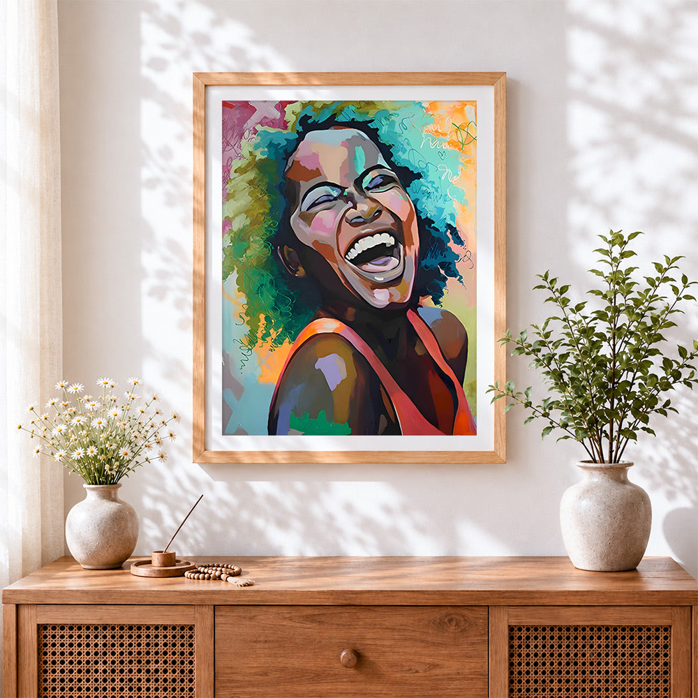Finished laughing woman with colourful hair cross stitch artwork displayed