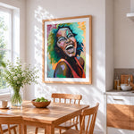 Laughing woman with colourful hair cross stitch artwork displayed on wall as home decor