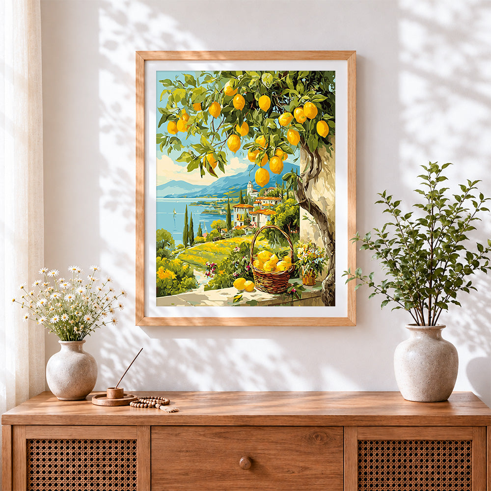Finished lemon tree and lakeside village cross stitch artwork displayed