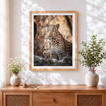 Finished leopard in natural habitat paint by numbers artwork displayed as home decor