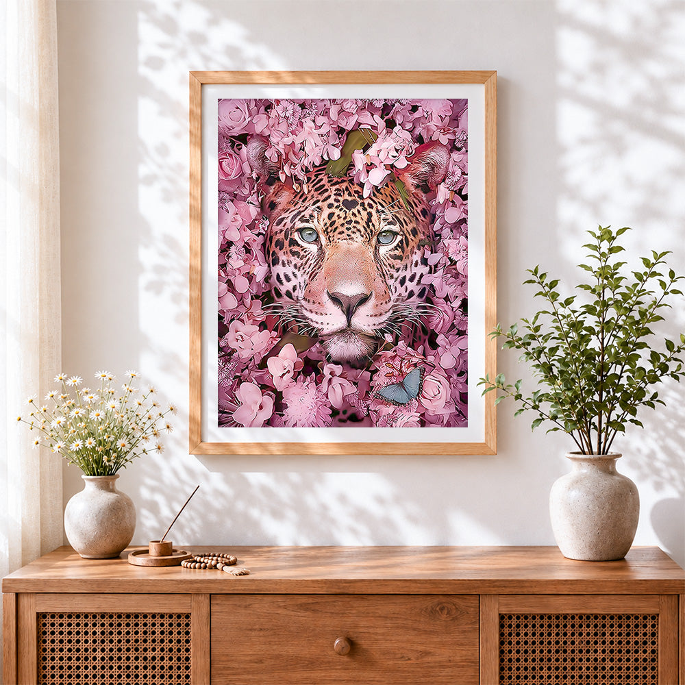 Finished leopard surrounded by pink blossoms paint by numbers artwork displayed as home decor