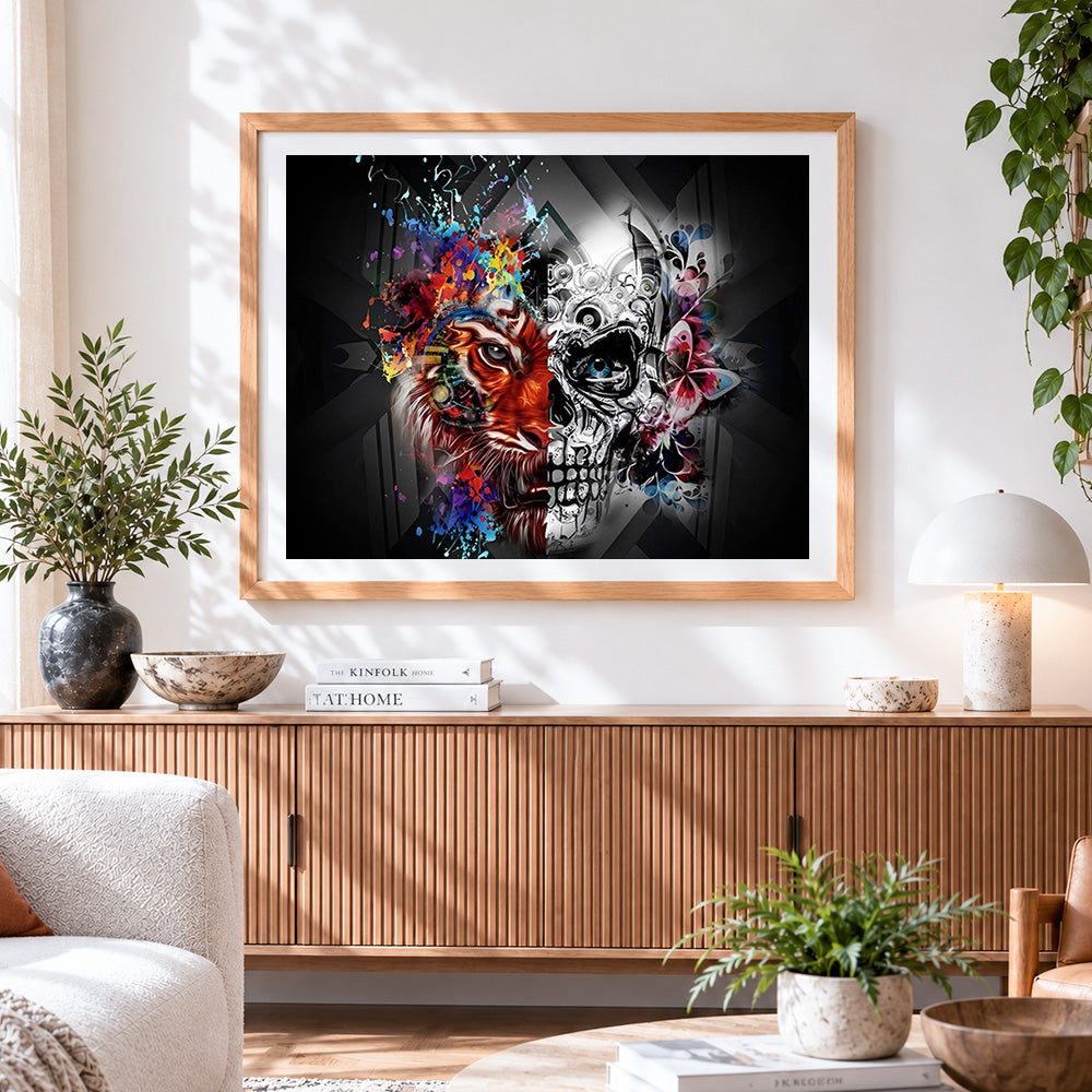 Finished lion and skull split face cross stitch artwork displayed