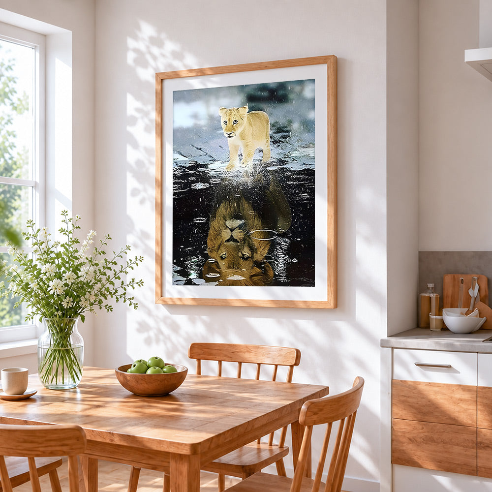 Lion cub reflection cross stitch artwork displayed on wall as home decor