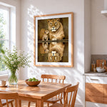 Lioness and cub reflection cross stitch artwork displayed on wall as home decor