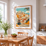 Lisbon tram and colourful houses cross stitch artwork displayed on wall as home decor