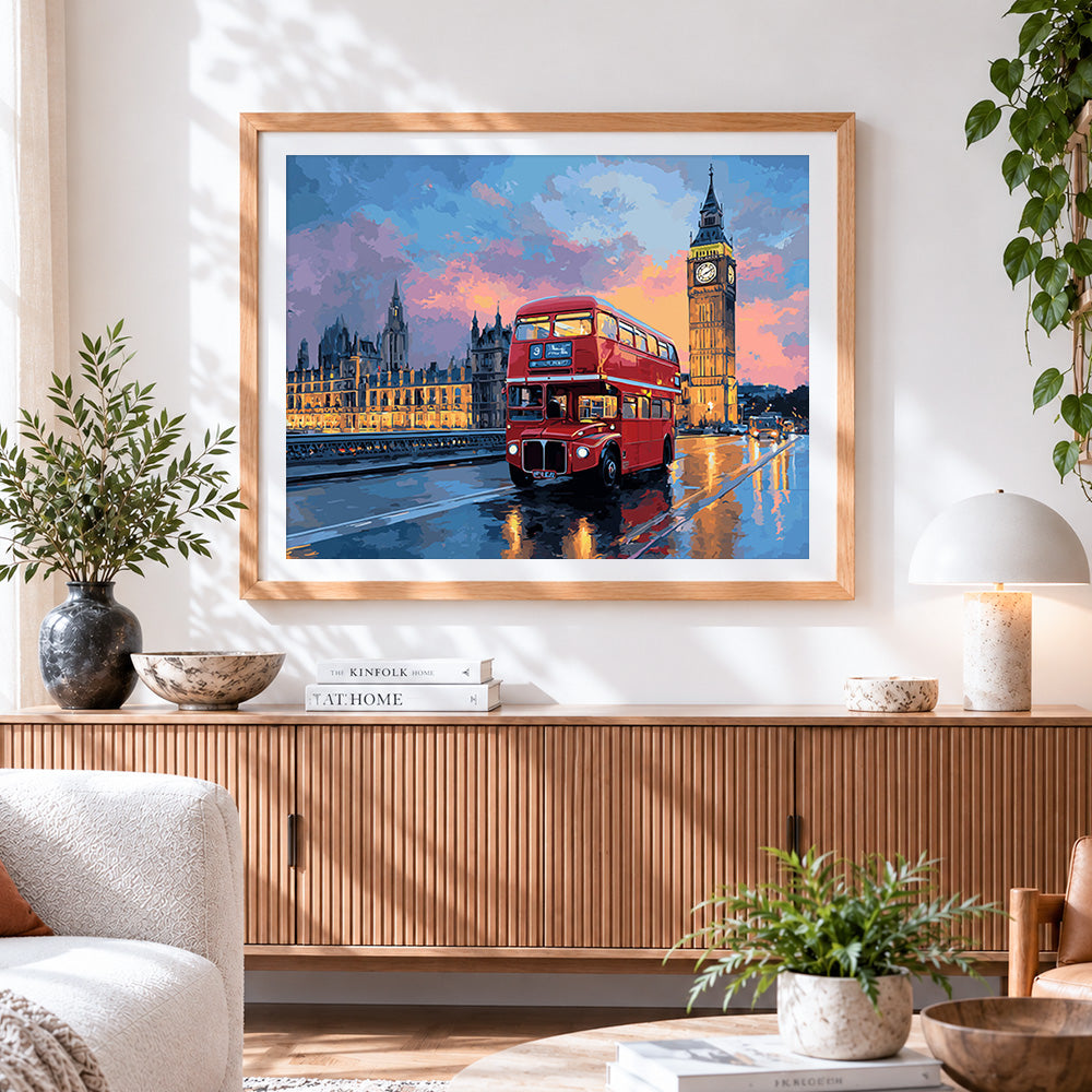 Finished london red bus and big ben at sunset cross stitch artwork displayed