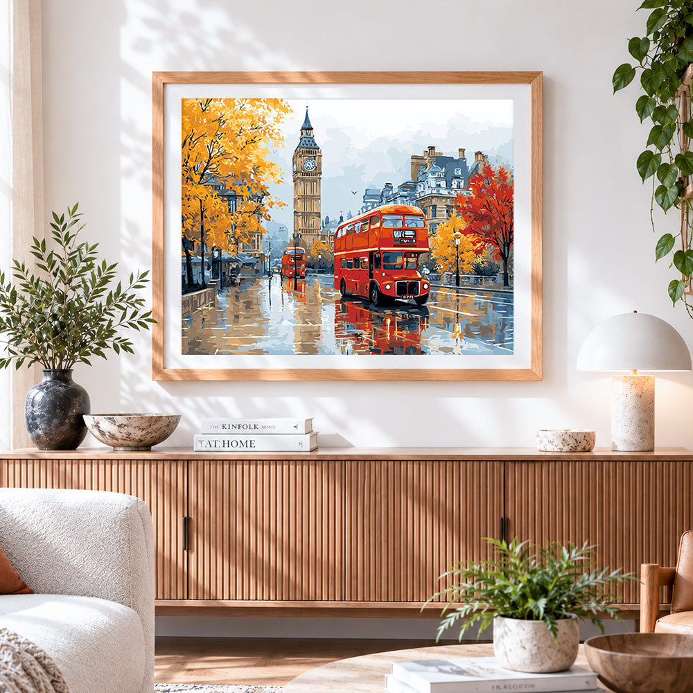 Finished london red bus and big ben in autumn cross stitch artwork displayed