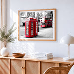 London red telephone boxes and bus cross stitch artwork displayed on wall as home decor