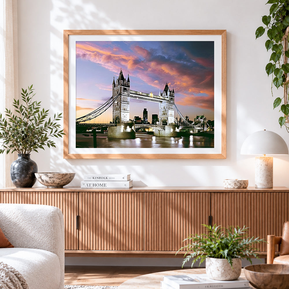 Finished london tower bridge illuminated at dusk cross stitch artwork displayed