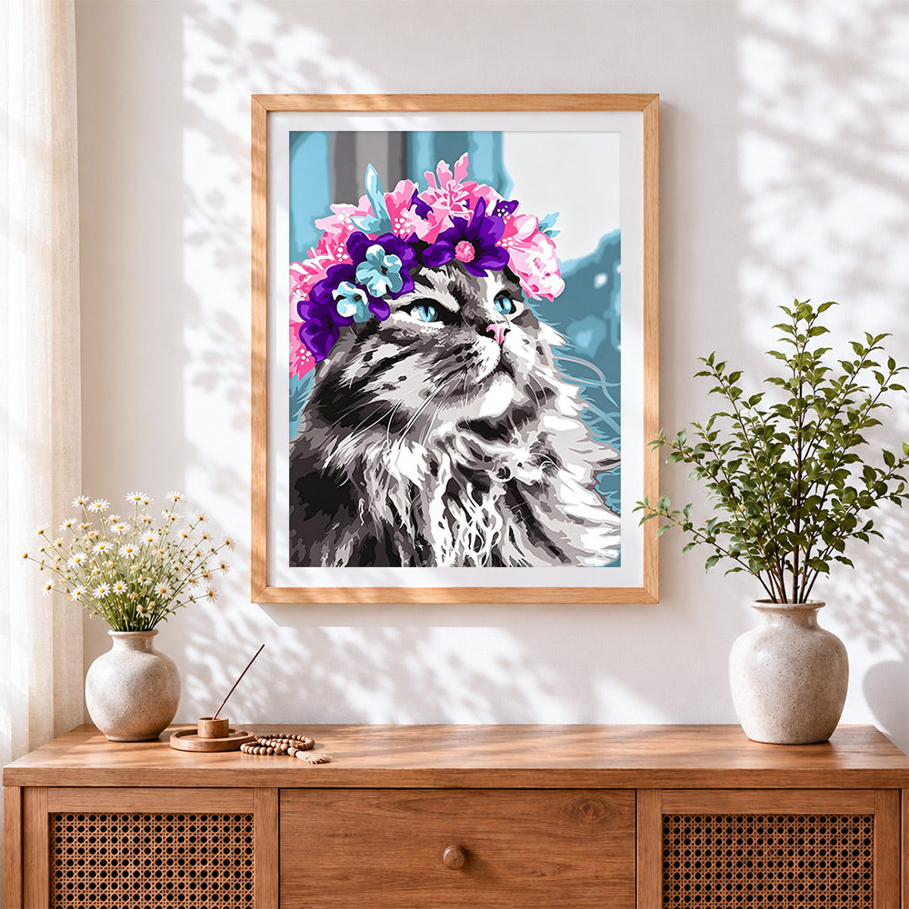 Finished long haired cat with flower crown cross stitch artwork displayed