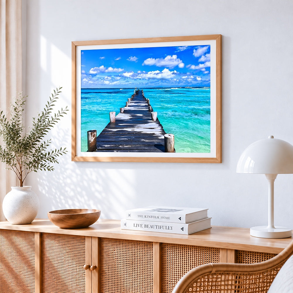 Long wooden pier over turquoise sea paint by numbers artwork displayed on wall as home decor