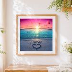 Finished "love" written in sand with heart paint by numbers artwork displayed as home decor