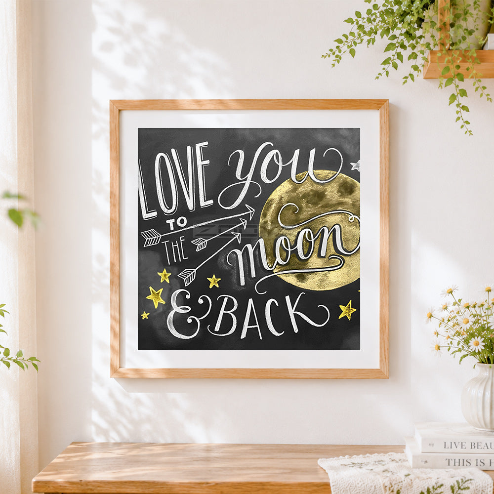 Finished love you to the moon and back chalkboard print cross stitch artwork displayed