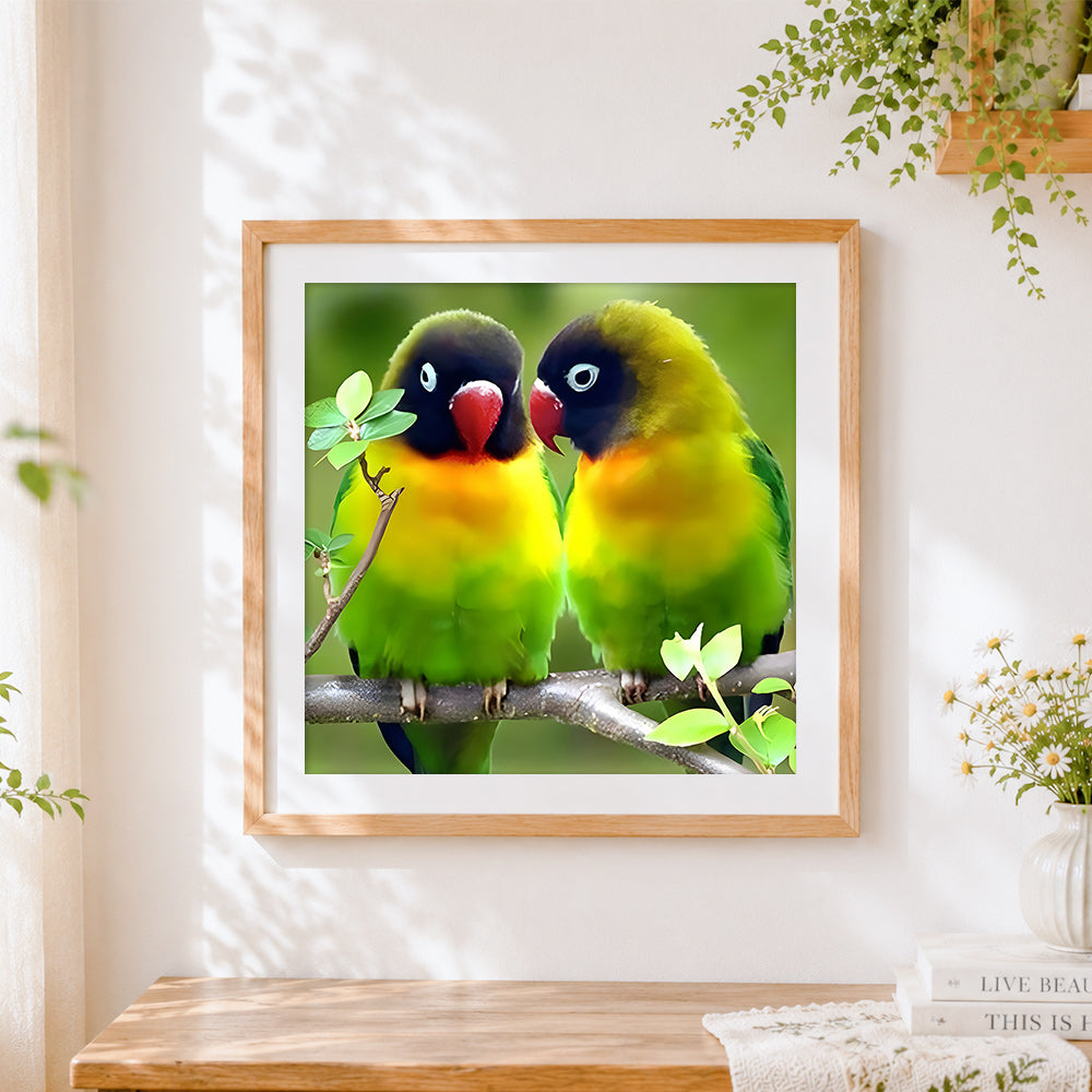 Finished lovebird parrots on branch cross stitch artwork displayed