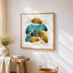 Luxurious gold and teal ginkgo leaves cross stitch artwork displayed on wall as home decor