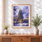 Finished magical city christmas tree and ice skating cross stitch artwork displayed