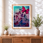 Finished magical glowing butterflies cross stitch artwork displayed