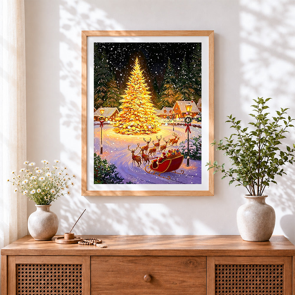 Finished magical glowing christmas tree and sleigh cross stitch artwork displayed