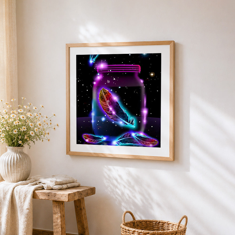 Magical glowing feather in a jar cross stitch artwork displayed on wall as home decor