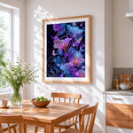 Magical glowing flowers and butterflies cross stitch artwork displayed on wall as home decor