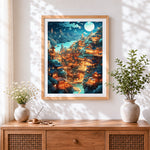 Finished magical moonlit village cross stitch artwork displayed