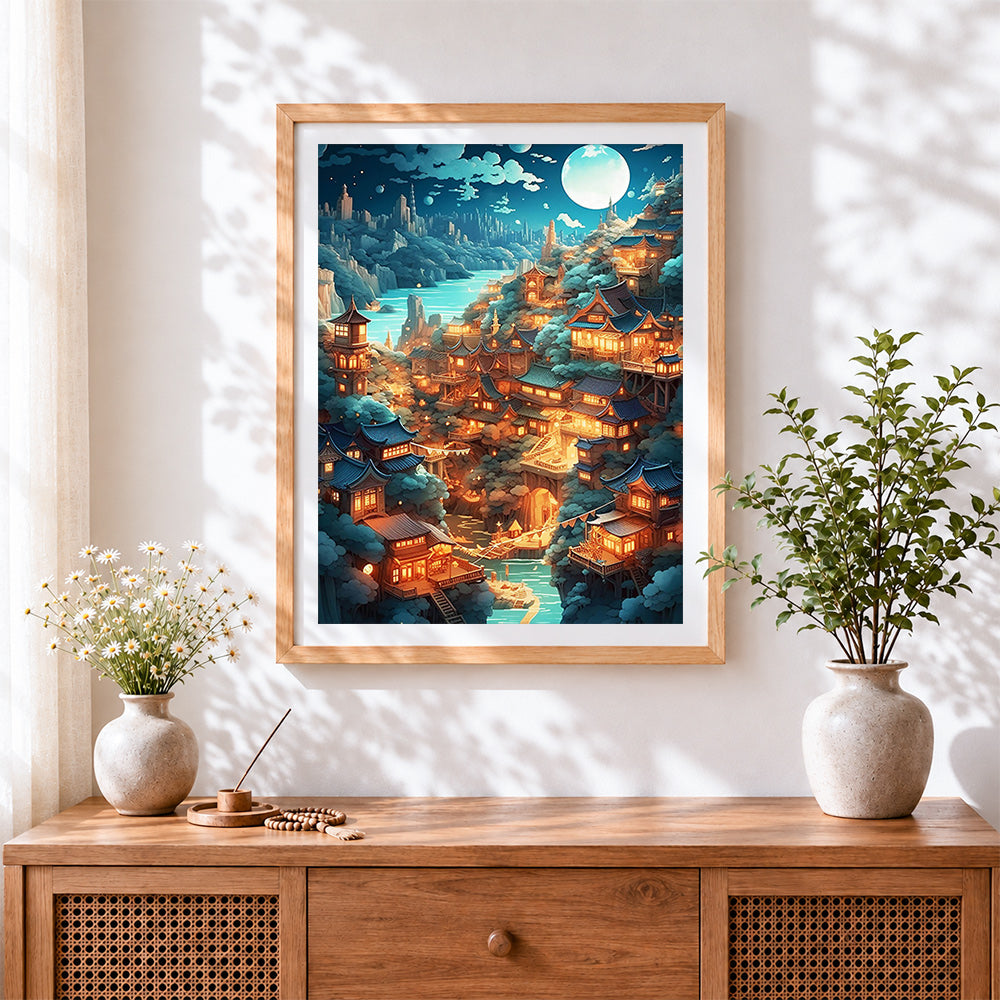 Finished magical moonlit village cross stitch artwork displayed