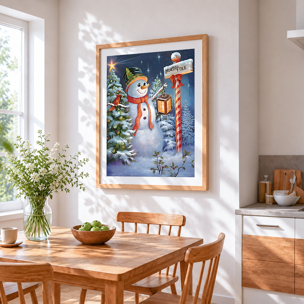 Magical snowman with lantern cross stitch artwork displayed on wall as home decor