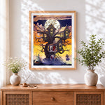 Finished magical treehouse and witches cross stitch artwork displayed
