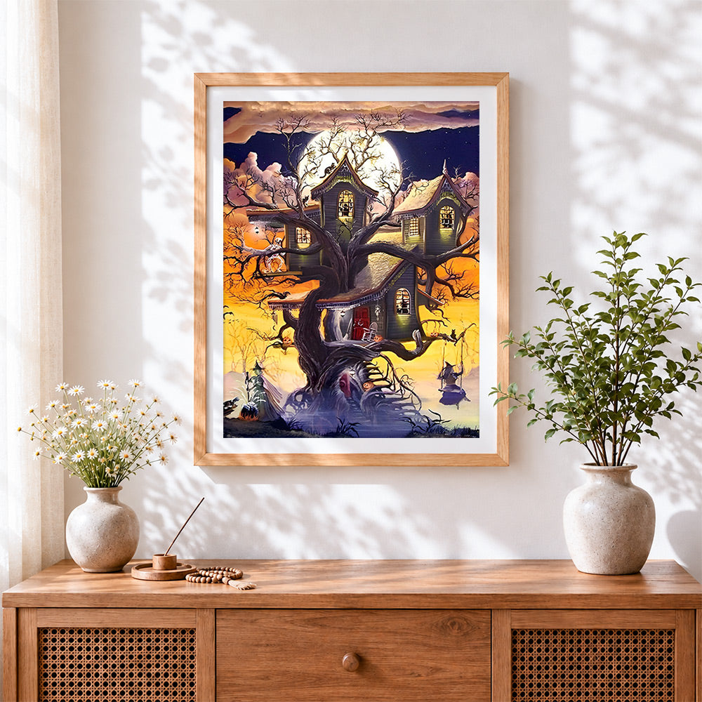 Finished magical treehouse and witches cross stitch artwork displayed