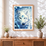 Finished magical white wolf with blue gems paint by numbers artwork displayed as home decor