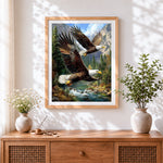 Finished majestic bald eagles in flight cross stitch artwork displayed