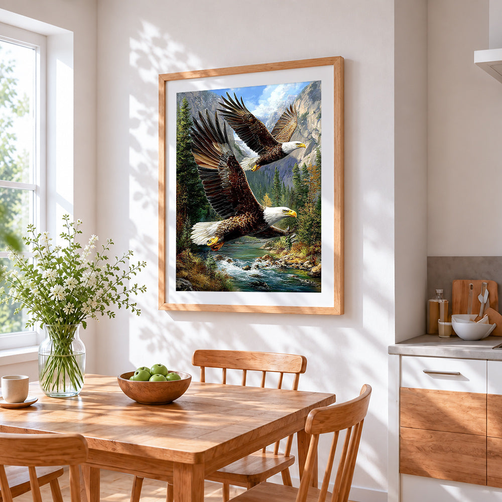 Majestic bald eagles in flight cross stitch artwork displayed on wall as home decor