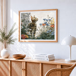 Majestic bengal cat in a wildflower garden cross stitch artwork displayed on wall as home decor