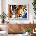 Finished majestic bengal tiger with blue eyes cross stitch artwork displayed