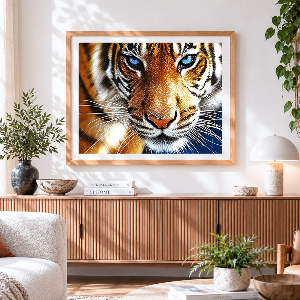 Finished majestic bengal tiger with blue eyes cross stitch artwork displayed