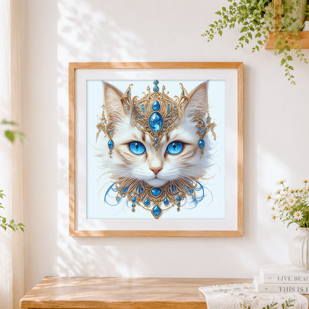 Finished majestic blue-eyed cat with gold jewellery cross stitch artwork displayed