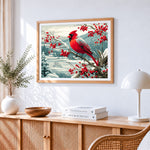 Majestic cardinal in a snowy winter landscape paint by numbers artwork displayed on wall as home decor
