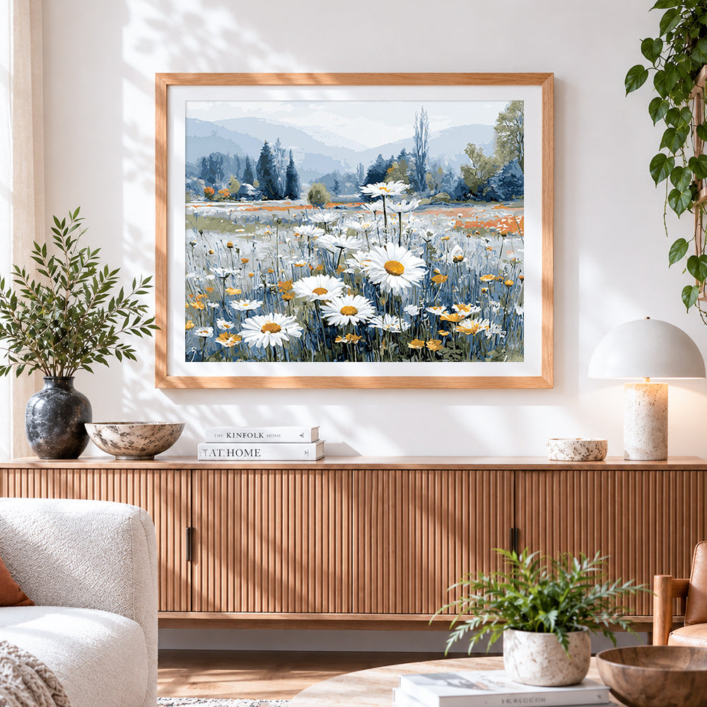 Finished majestic daisy field in a mountain valley cross stitch artwork displayed