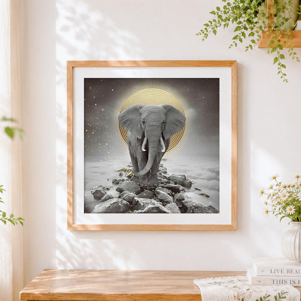 Finished majestic elephant with golden halo cross stitch artwork displayed
