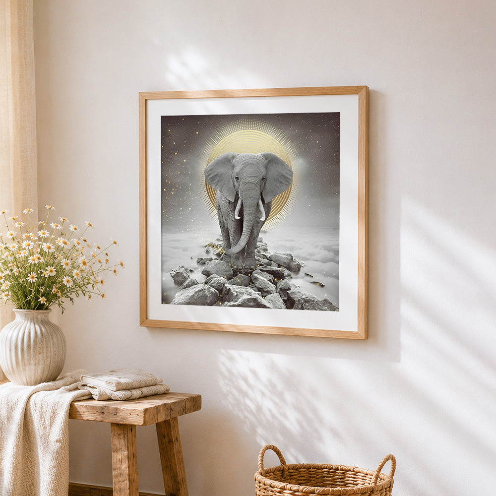 Majestic elephant with golden halo cross stitch artwork displayed on wall as home decor