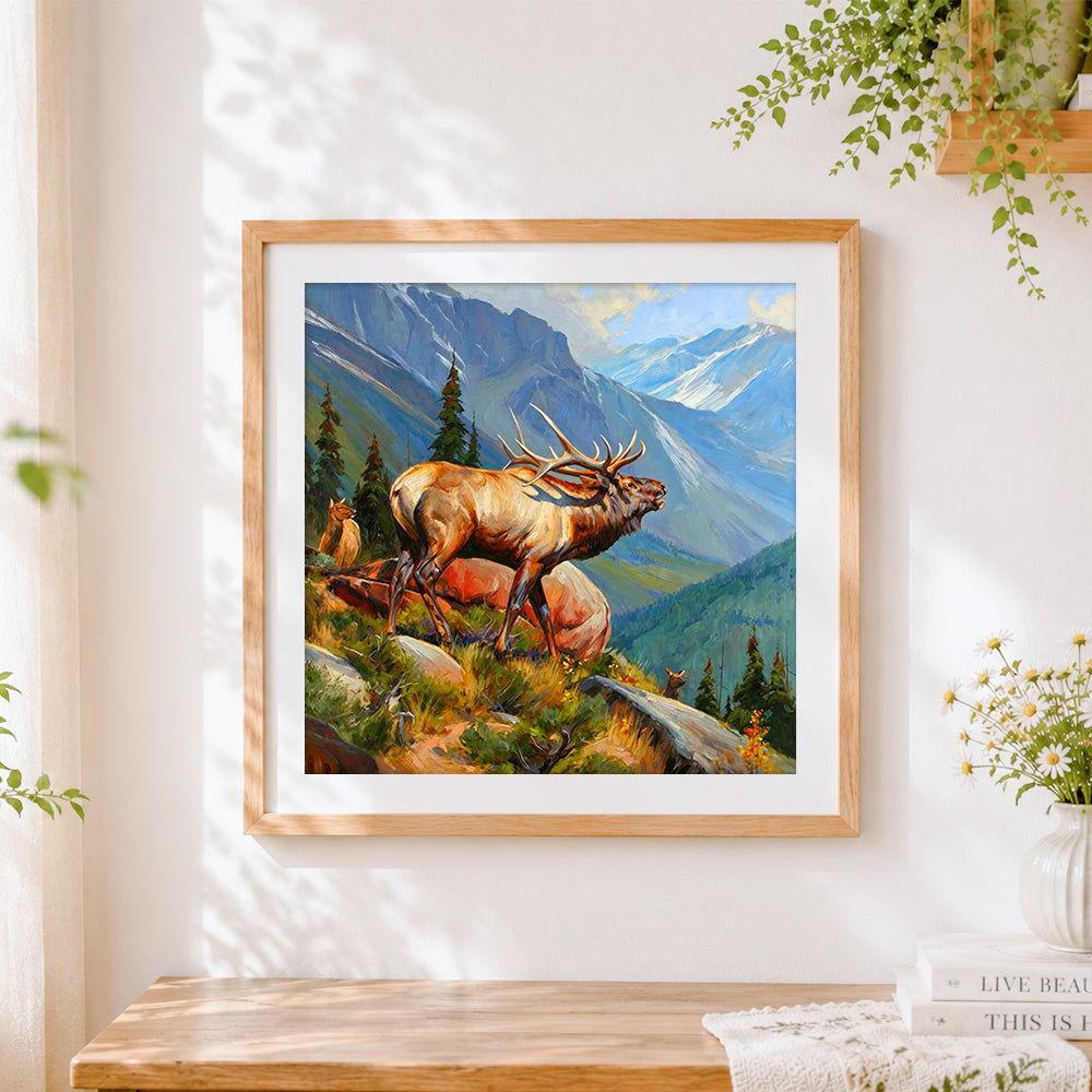 Finished majestic elk in mountain landscape cross stitch artwork displayed