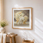 Majestic golden unicorn in mist cross stitch artwork displayed on wall as home decor