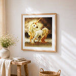 Majestic golden unicorn with flowing mane cross stitch artwork displayed on wall as home decor