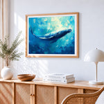 Majestic humpback whale in the deep blue ocean cross stitch artwork displayed on wall as home decor
