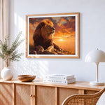 Majestic lion at sunset cross stitch artwork displayed on wall as home decor