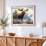 Majestic moose by a lake cross stitch artwork displayed on wall as home decor