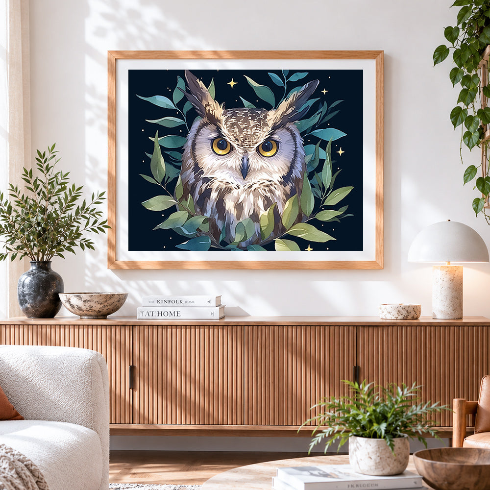 Finished majestic owl with green leaves cross stitch artwork displayed