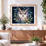Finished majestic owl with green leaves cross stitch artwork displayed