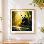 Finished majestic panda by a sunlit bamboo stream cross stitch artwork displayed