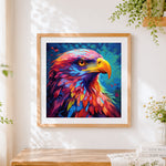 Finished majestic rainbow eagle cross stitch artwork displayed